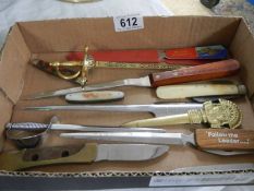 A mixed lot of pen knives and letter openers.