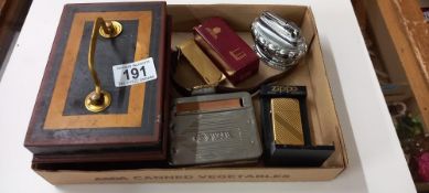 A vintage Dunhill empty lighter box, Zippo lighter etc plus Rotary quartz watch and old tin