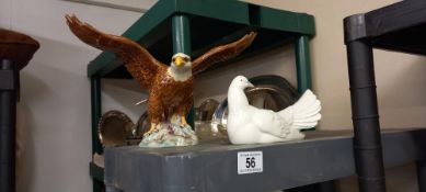 A Beswick golden eagle (foot a/f but sympathetic repair) and a Requena dove