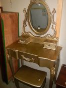 A mid 20th century gold painted dressing table with stool. COLLECT ONLY.