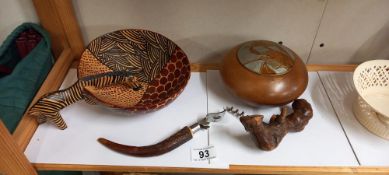A wooden handled cork screw and bottle opener, a lidded wooden bowl and a decorative wooden