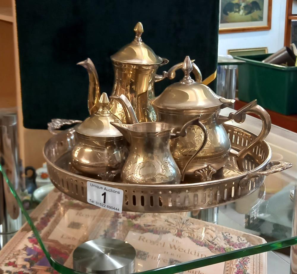 A cased silver plate tea set