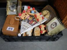 A mixed lot including clocks, boxes, fan etc.,