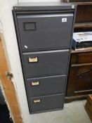 A four drawer metal filing cabinet, COLLECT ONLY.