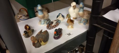 A quantity of porcelain ducks etc including Russian examples