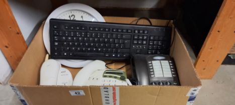A quantity of telephones, keyboard and clock