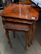 A nest of three figured mahogany tables, COLLECT ONLY
