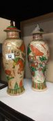 A pair of vintage crackle glazed lidded oriental vases a/f