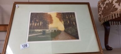 A framed and glazed coloured etching manor house by Frederick Louis Leve exhibited 1906 in