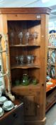 A solid pine corner unit with cupboard base, H191cm x W75cm x D40cm COLLECT ONLY