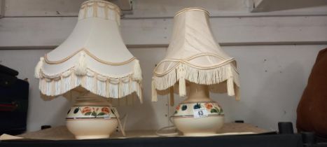 A pair of porcelain C.P.P. Rye lamp bases with similar shades COLLECT ONLY