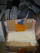 A mixed lot of household linen - tea towels, new bed sheets, table cloths etc.,