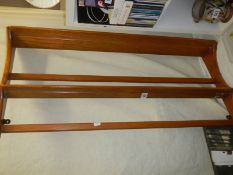 A two shelf wooden wall mounting plate rack, COLLECT ONLY.