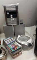 A Sharp music system, Phillips cd player and quantity of CD's