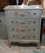 A vintage French style four drawer chest with swag detail, missing 1 drawer knob COLLECT ONLY