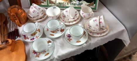 A set of 4 Royal Worcester Evesham cups and saucers and an 18 piece Royal Osbourn tea set
