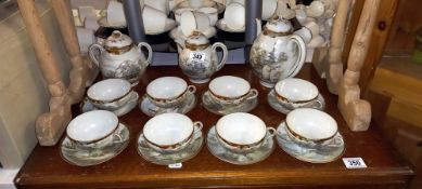 An 8 piece setting oriental egg shell tea set COLLECT ONLY