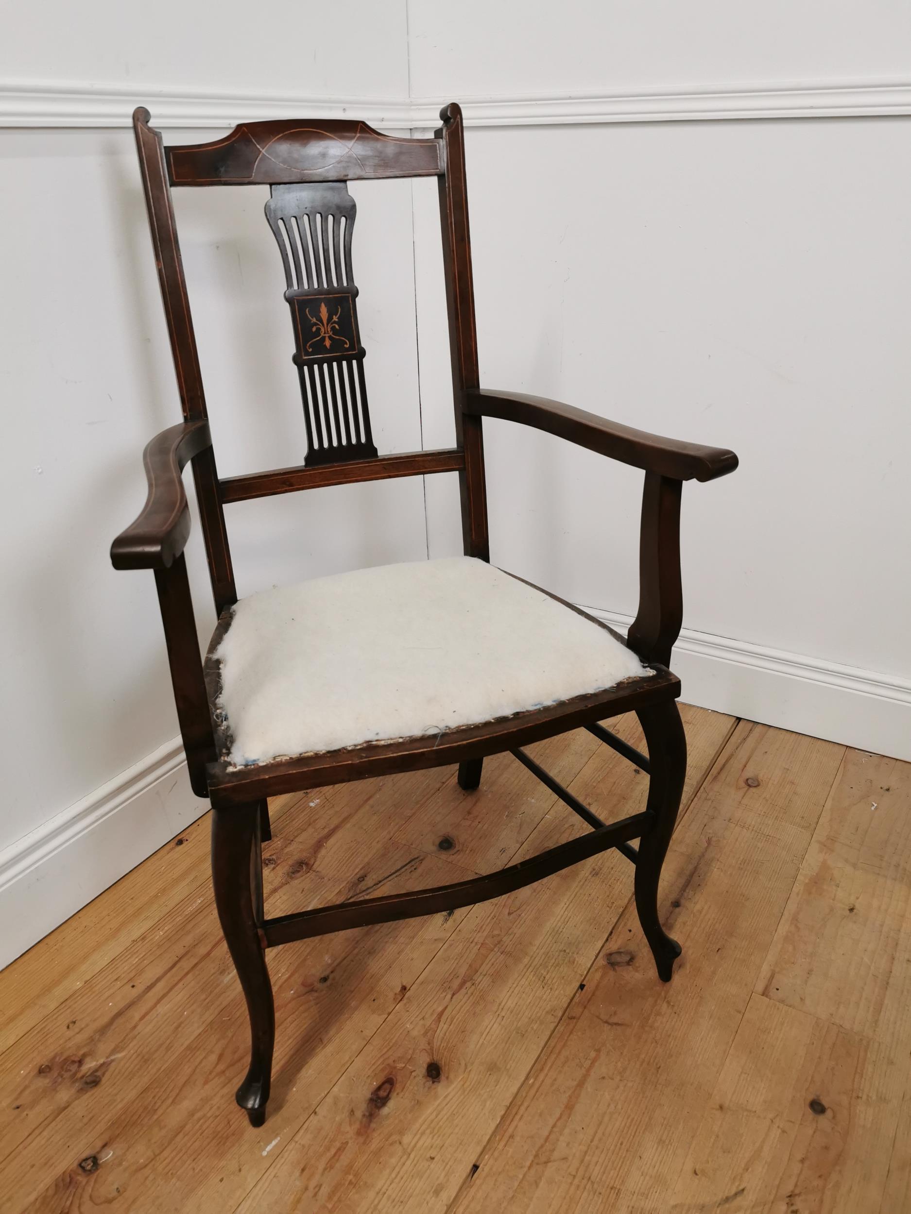 Edwardian inlaid mahogany open armchair raised on cabriole legs { 100cm H X 60cm W X 50cm D }.