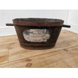 Early 20th. C. oak metal bound log bucket { 30cm H X 80cm W X 40cm D }.