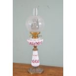 19th C. oil lamp with etched glass football shade {66cm H}.