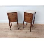 Pair of 19th C. mahogany bedside cabinets with single drawer above panel door and marble tops raised