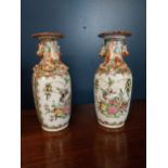 Pair 19th C. Oriental hand painted ceramic vases {20 cm H x 9 cm Dia.}.