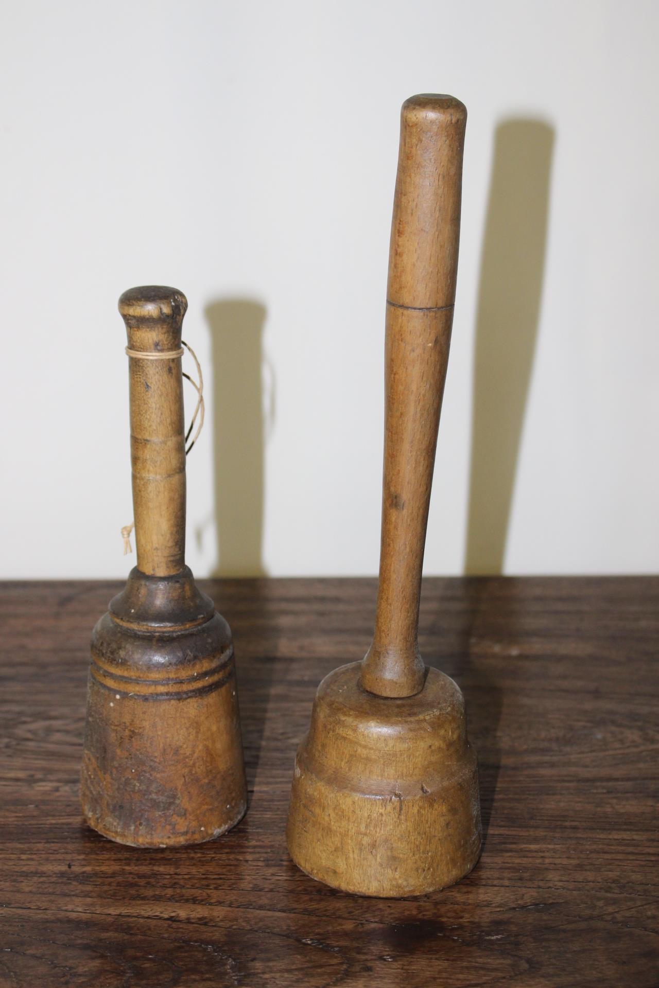 Pair of 19th C. wooden butter mallets {32 cm H x 8 cm Dia.}.