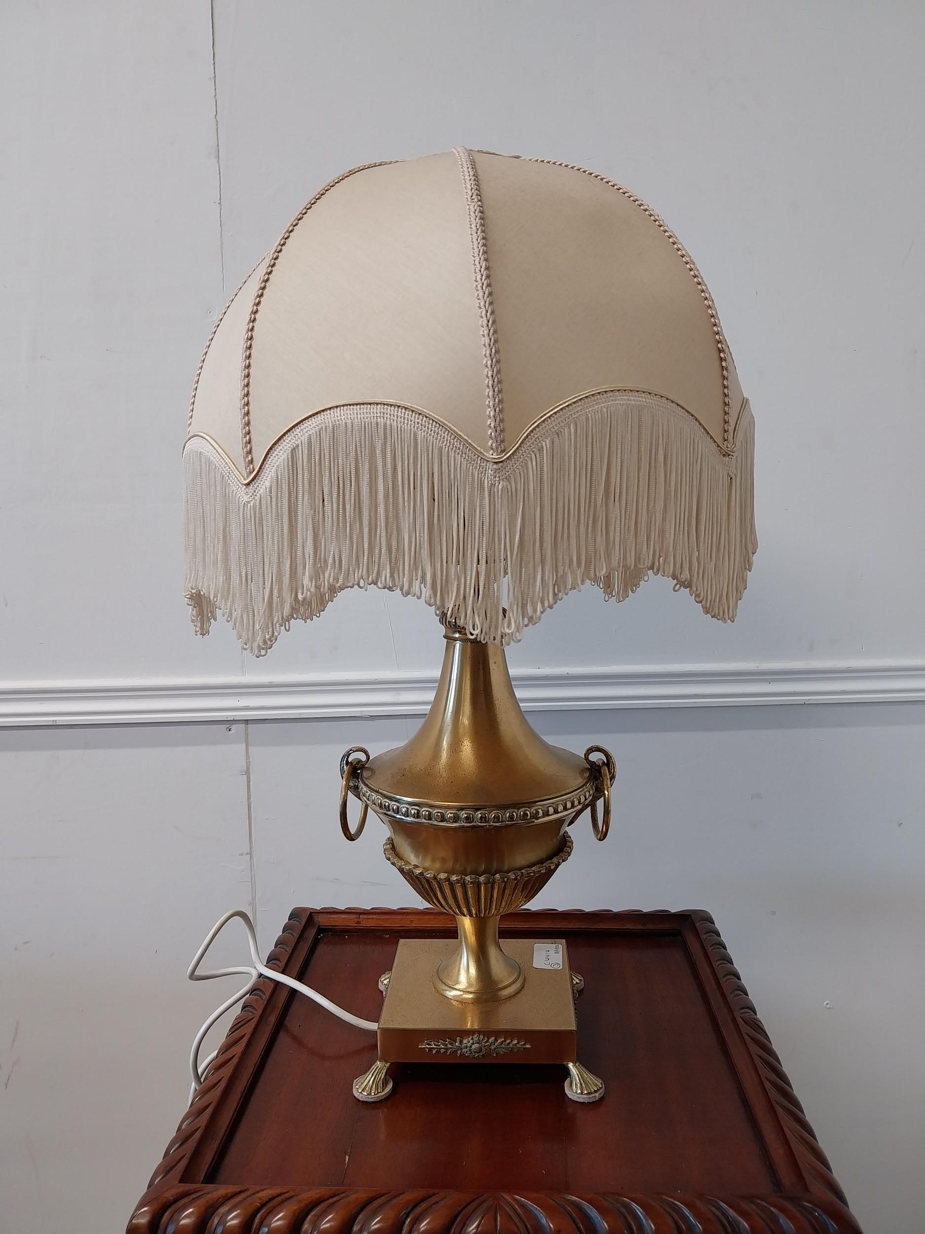 Brass table lamp in the form of an urn with cloth shade {60cm H x 33cm Dia.}