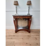 William IV flamed mahogany console table with marble top and mirrored back supported on cabriole