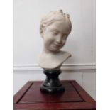 Marble resin bust of a young girl {40 cm H x 22 cm W x 17 cm D}.