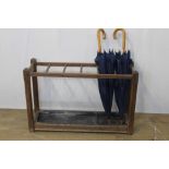 Oak umbrella and stick stand with galvanised metal tray {61 cm H x 92 cm W x 30 cm D}.