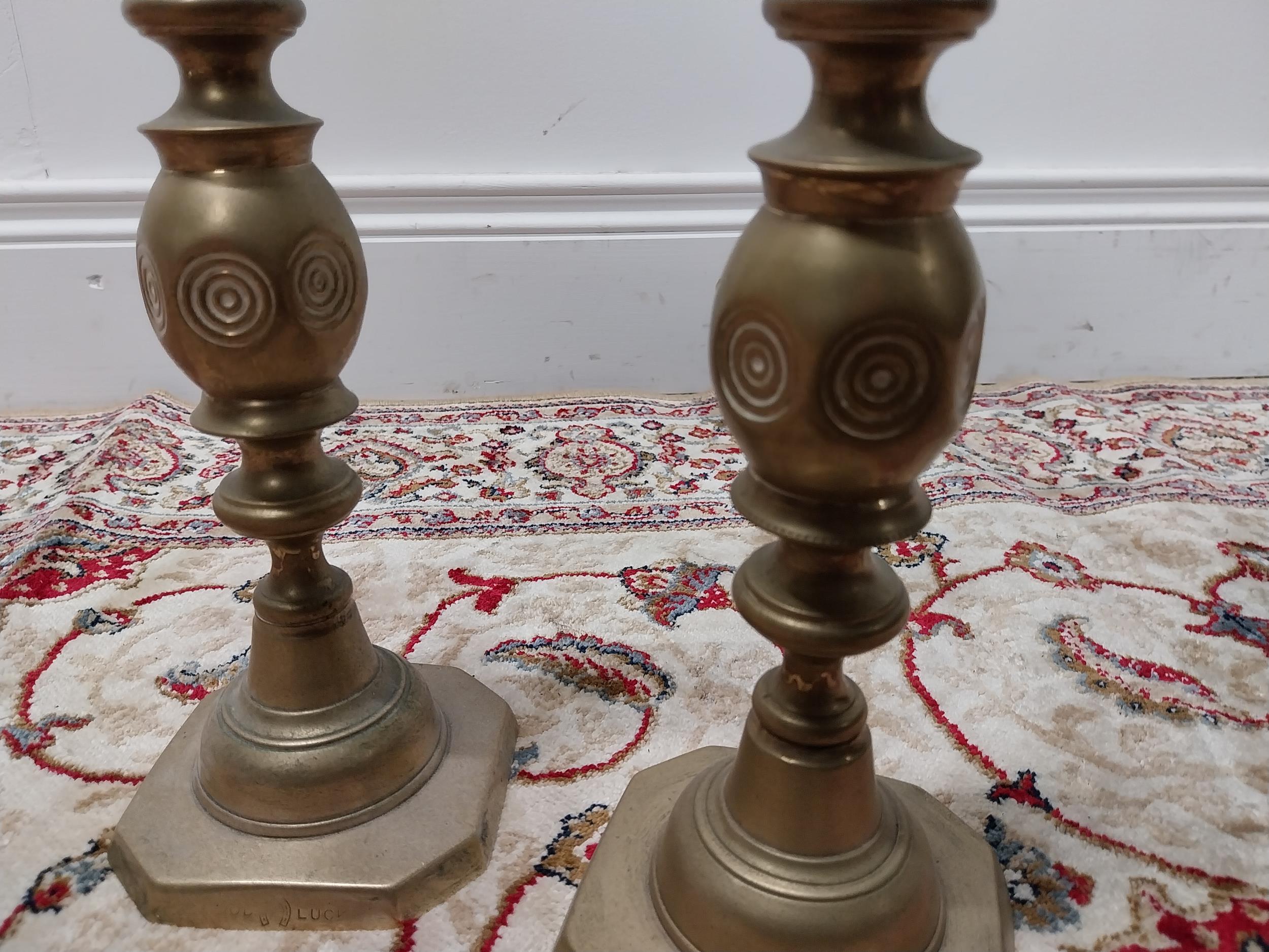 Pair of brass candlesticks {29 cm H x 10 cm W x 10 cm D}. - Image 2 of 3