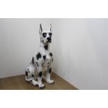 Ceramic model of a Dalmatian dog {75 cm H x 30 cm W x 47 cm D}.