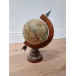 1980s world globe on mahogany stand {37 cm H x 22 cm Dia.}.