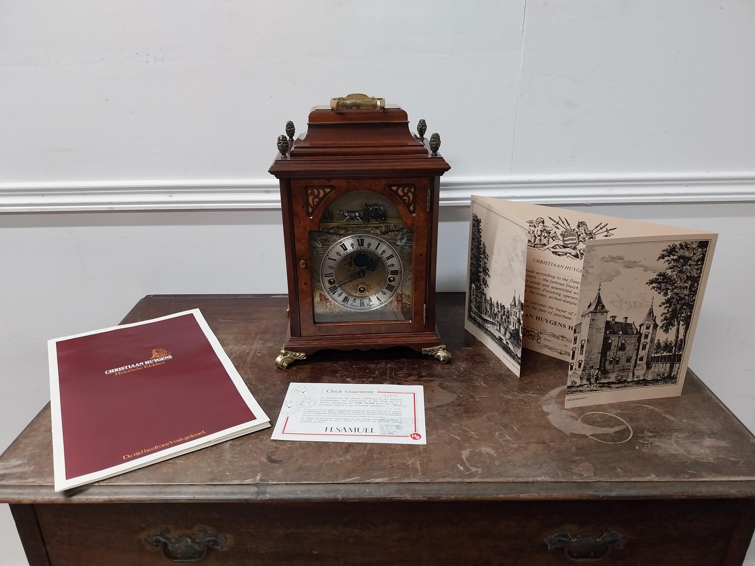 Burr walnut bracket clock with painted brass and silver dial on brass bracket feet made by