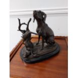 Bronze model of hunting dog and hare mounted on marble base {24 cm H x 25 cm W x 14 cm D}.