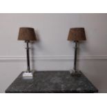 Pair of brass and chrome table lamps with cloth shades {54 cm H x 24 cm Dia.}.