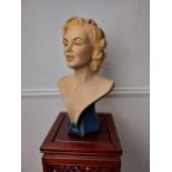 Plaster bust of Marilyn Monroe {52 cm H x 30 cm W x 24 cm D}.