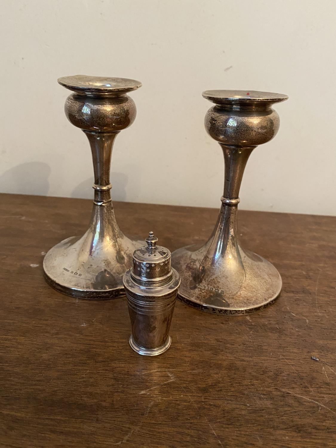 Pair of English silver candlesticks Hallmarked in Birmingham 1931 -32, L. Smith & Co { 14cm H }