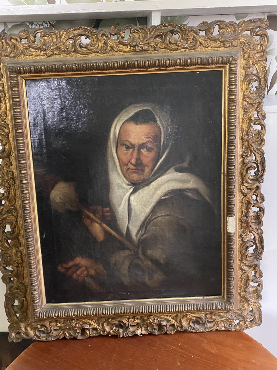18th. C. Dutch School Old Woman Spinning Oil on Canvas mounted in a gilt frame { 81cm H X 70cm W }