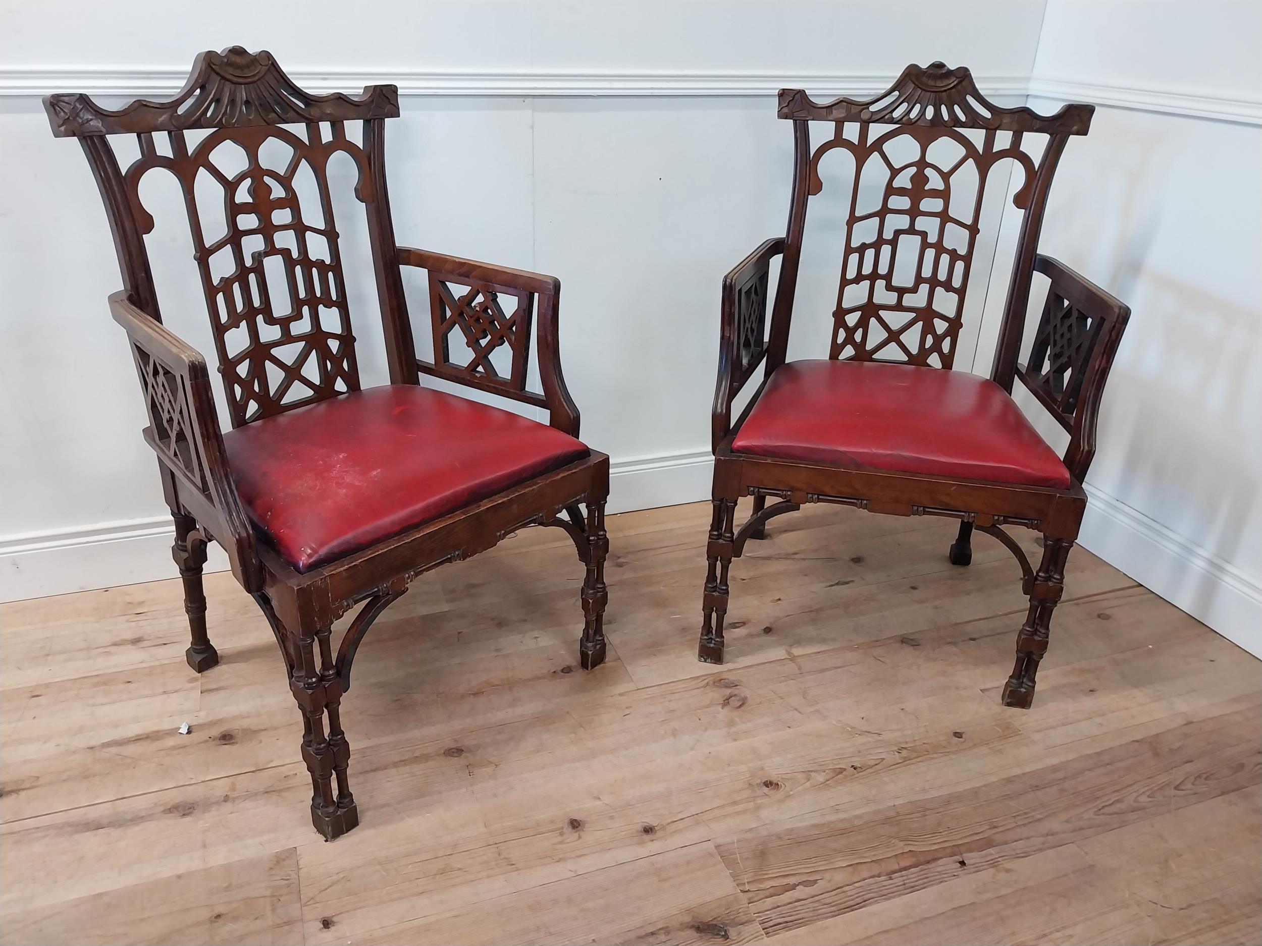 Pair of carved mahogany Chinese Chippendale style armchairs with inset leather seats {105cm H x 78cm