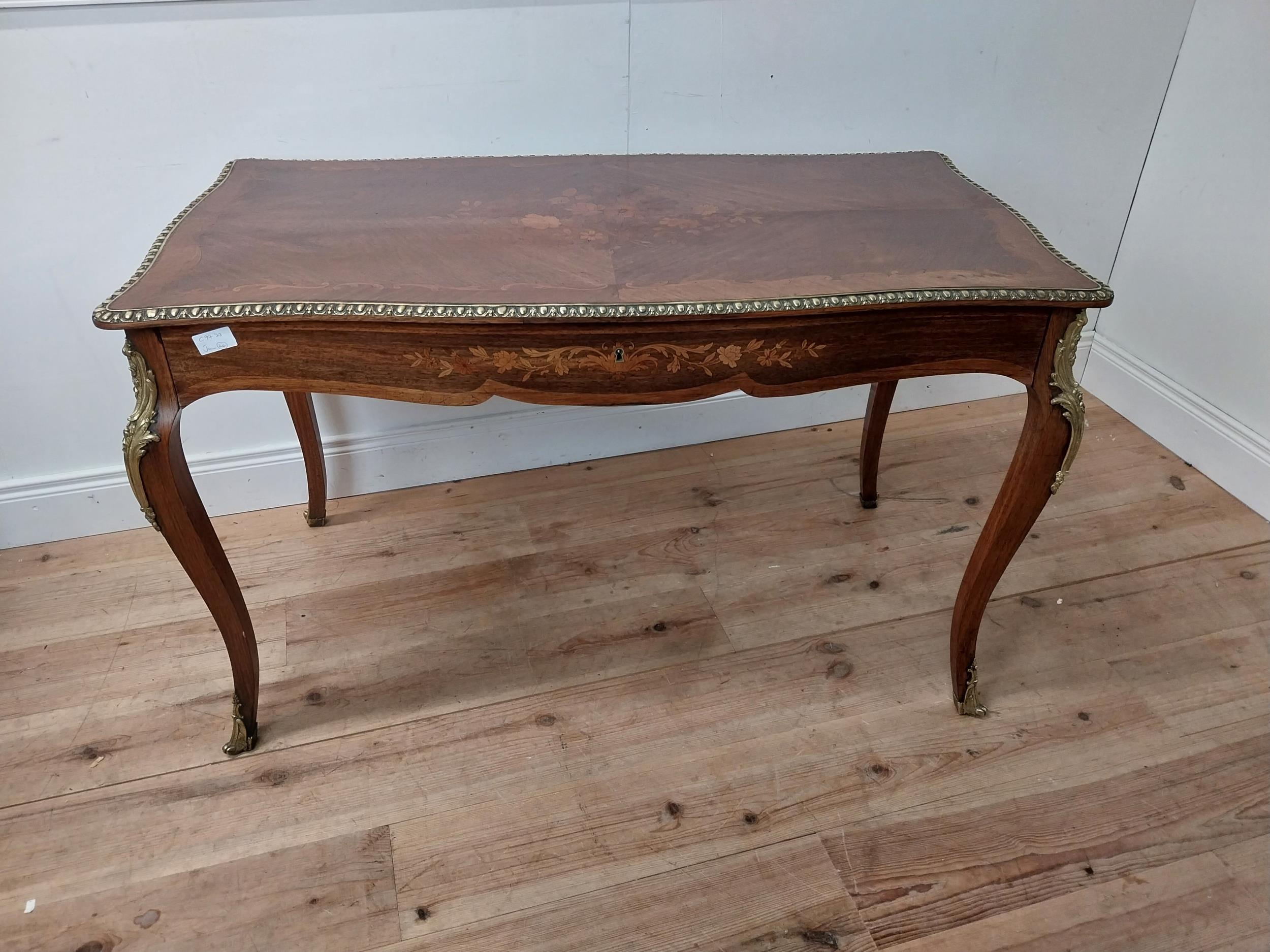 Exceptional quality French inlaid kingwood centre table with ormolou mounted raised on cabriole legs