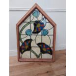 Art Nouveau stained glass panel mounted in strip pine frame {110 cm H x 75 cm W}.