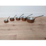 Good quality set of five early 20th C. graduated copper saucepans stamped made in France {12 cm H