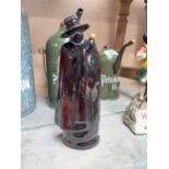 Wade ceramic Sandeman Port advertising figure. {21 cm H x 9 cm W x 6 cm D}.