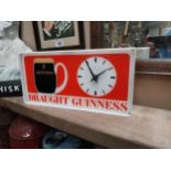 Draught Guinness Perspex advertising clock {18cm H x 36cm W x 8cm D}.