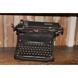 Vintage typewriter {23 cm H x 45 cm W x 33 cm D}.