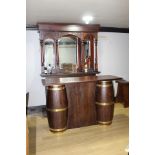 Mahogany home bar and back bar with brass bound barrel front and mirrored back {230 cm H x 220 cm