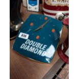 Double Diamond ceramic advertising clock { 23cm H X 20cm W }.