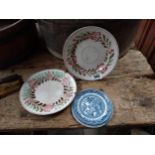 Two brush ware ceramic plates and willow pattern teapot stand {23 Dia. And 16 Dia.}.